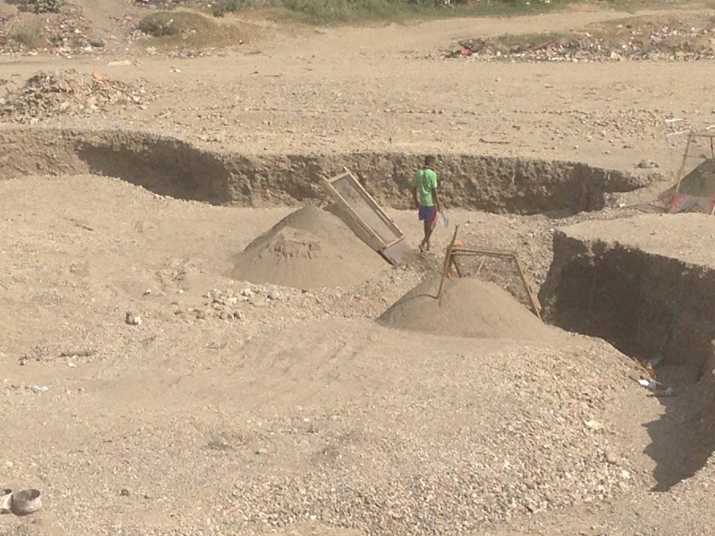 Harvesting gravel Dili style